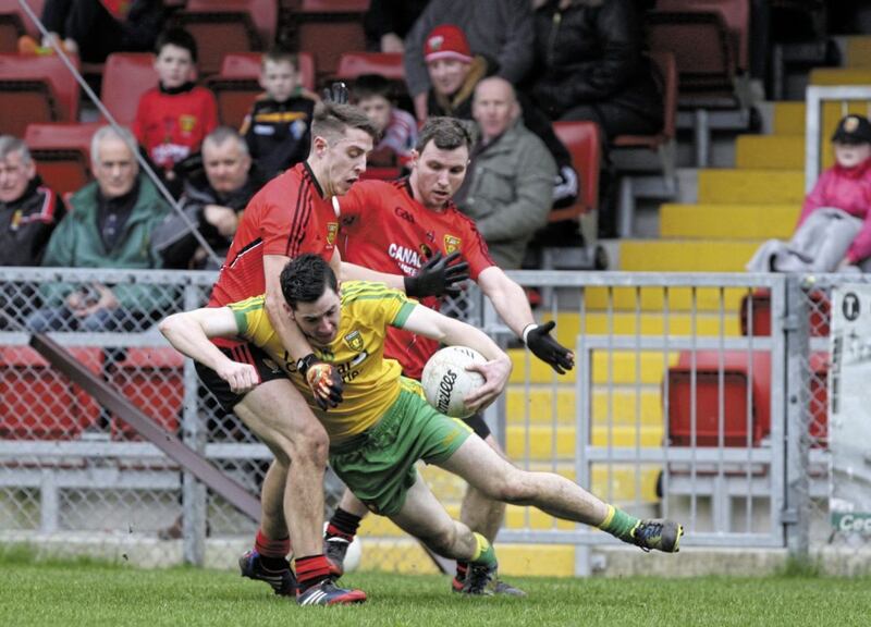 Owen Costello (right) won a second Down intermediate title with Bredagh last month 