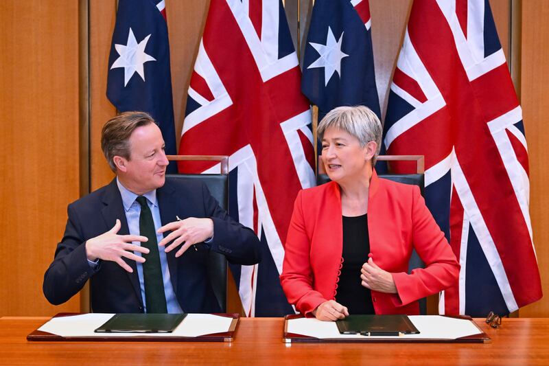 Foreign Secretary David Cameron, left, and Australian Foreign Minister Penny Wong (Lukas Coch/AAP Image/AP)