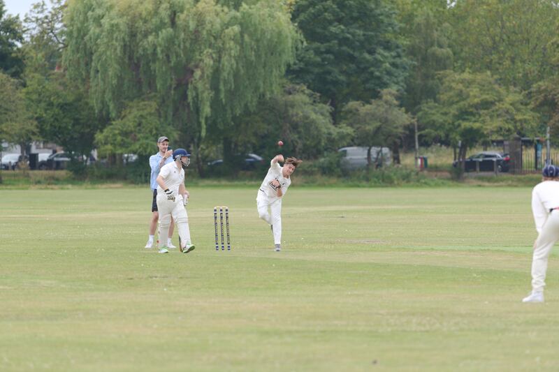 Tom Dunn, who co-founded the Dell Boys Cricket Club, bowled the first bowl for his team after running 24.5km (Nick Dunn)