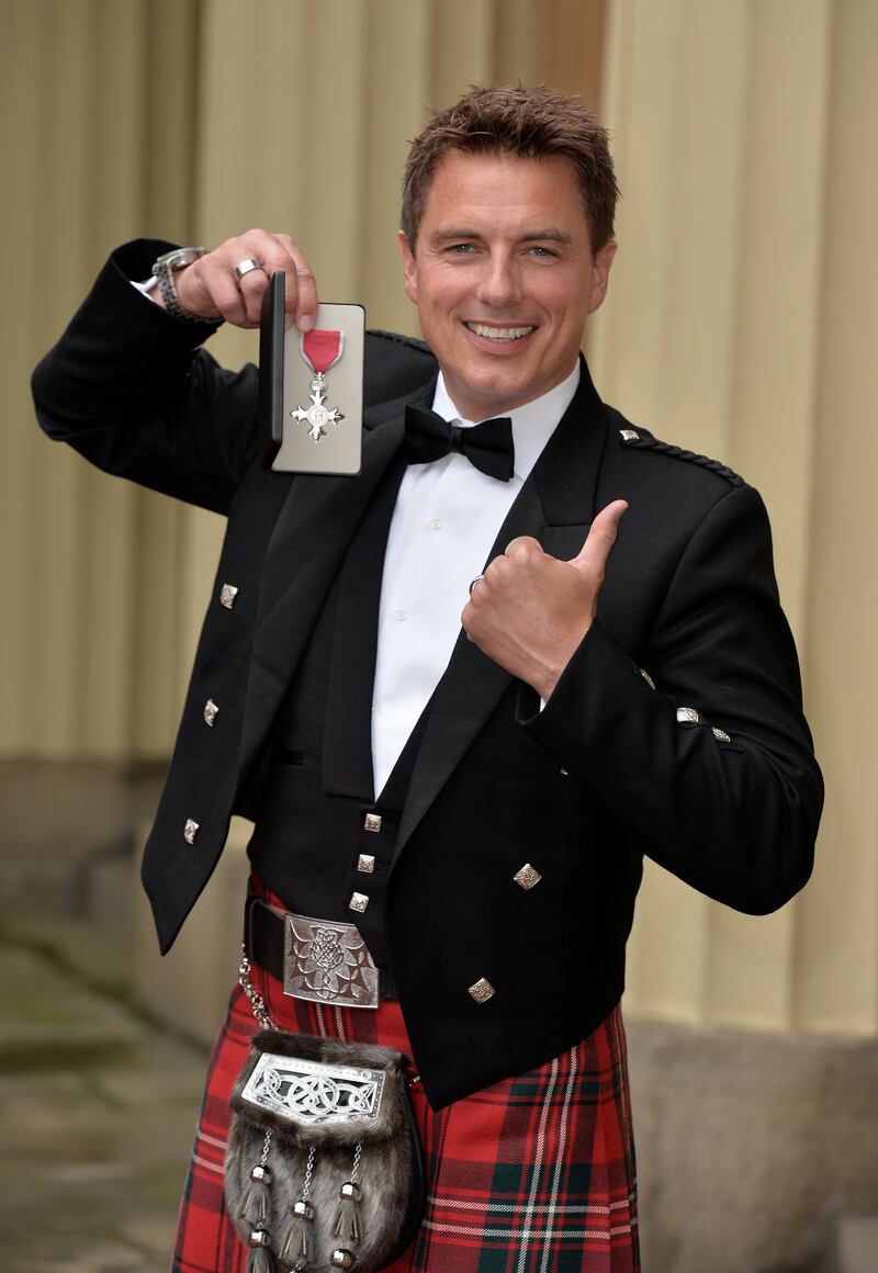 John Barrowman after being awarded an MBE