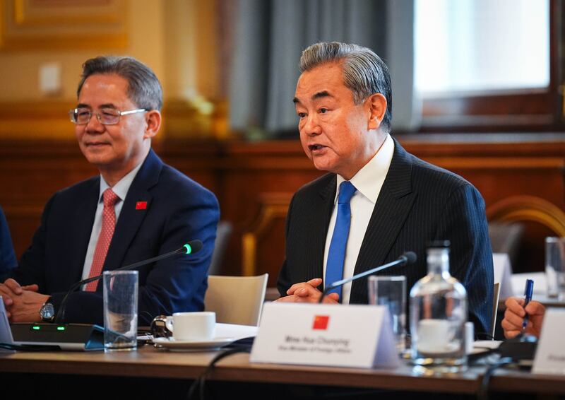 Wang Yi, right, also met UK national security adviser Jonathan Powell