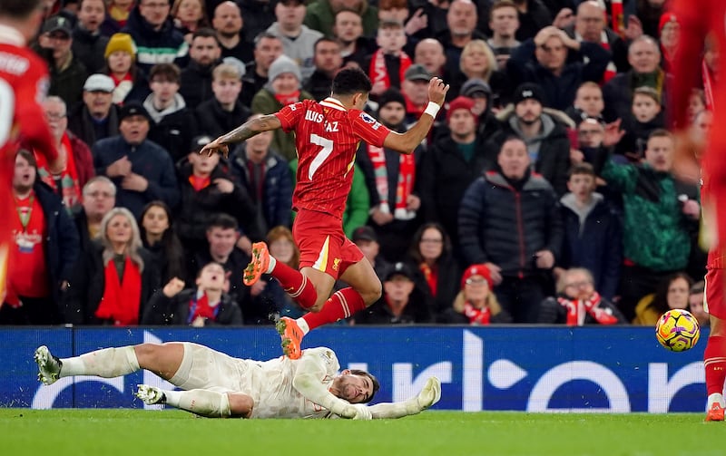 Stefan Ortega, pictured bringing down Luis Diaz to concede a penalty, was selected over Ederson on Sunday