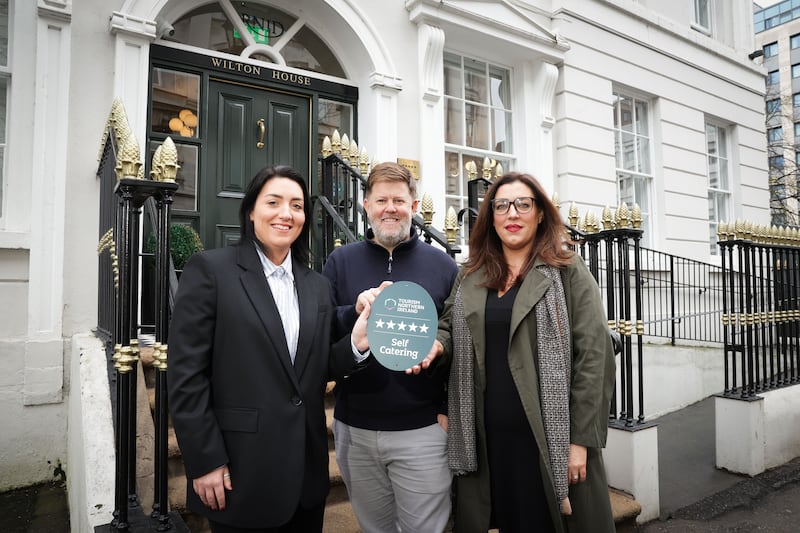 Justin Quirk (centre) with Wilton House property manager Melissa Crossley and Tourism NI’s Claire McNaughton, after the self-catering apartments were awarded a five-star accommodation grade.