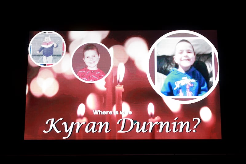 A screen displays a message at a vigil for Kyran Durnin in Dundalk