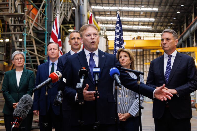 Defence Secretary Grant Shapps speaks to the media as Premier of South Australia Peter Malinauskas, third left, Australian Minister for Foreign Affairs Penny Wong, left, Deputy Prime Minister of Australia Richard Marles, right, Foreign Secretary David Cameron and United States Ambassador to Australia Caroline Kennedy, second right, listen during a visit to the Osborne Naval Shipyard in Adelaide (Matt Turner/AAP/AP)