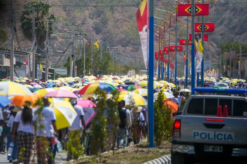 People started queuing before dawn to attend the Mass (Gregorio Borgia/AP)