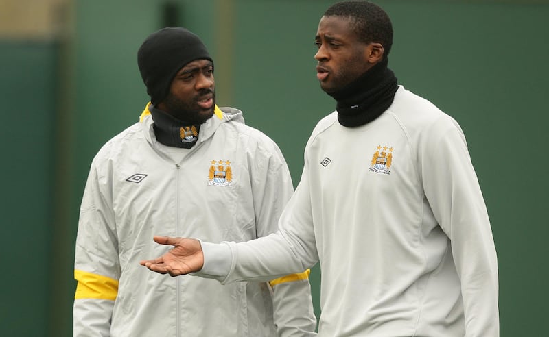 Yaya Toure, right, linked up with brother Kolo at Manchester City in 2010