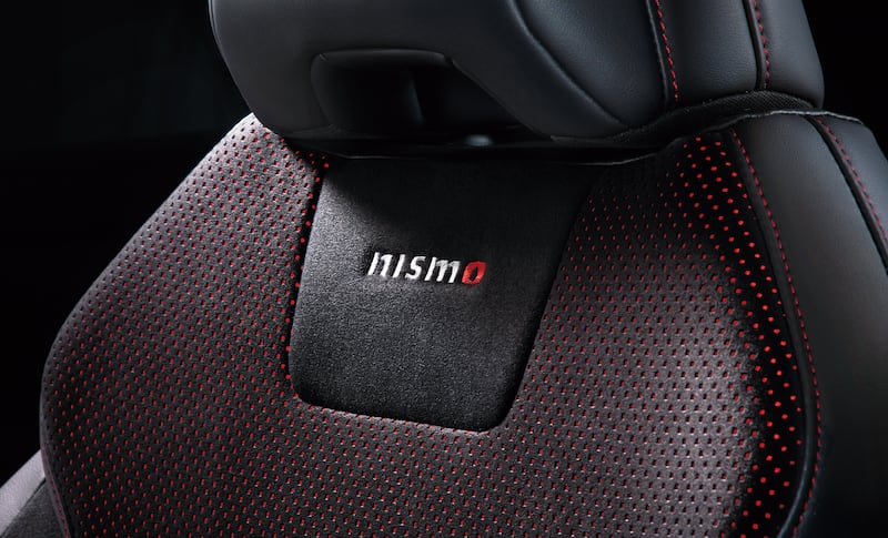 Nismo badging is applied throughout the car