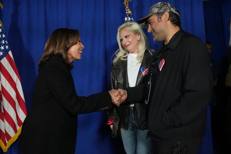 Democratic presidential nominee Vice President Kamala Harris, from left, greets Lady Gaga and her husband Michael Polansky at a campaign rally outside the Philadelphia Museum of Art, Monday in Philadelphia (Jacquelyn Martin/AP)