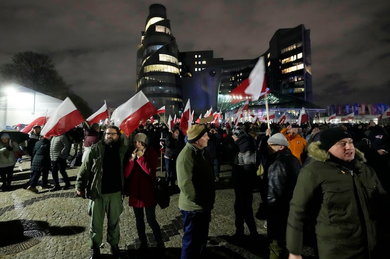 Some members of the Law and Justice party protested outside the headquarters of Poland’s state-owned TVP broadcaster (Czarek Sokolowski/AP)