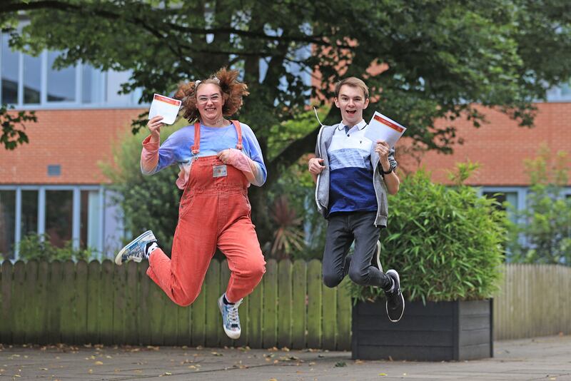 Head girl Mirran Morrison and head boy Chris Cassells receive their A-level results at Lagan College, Belfast. Picture by Liam McBurney/PA Wire