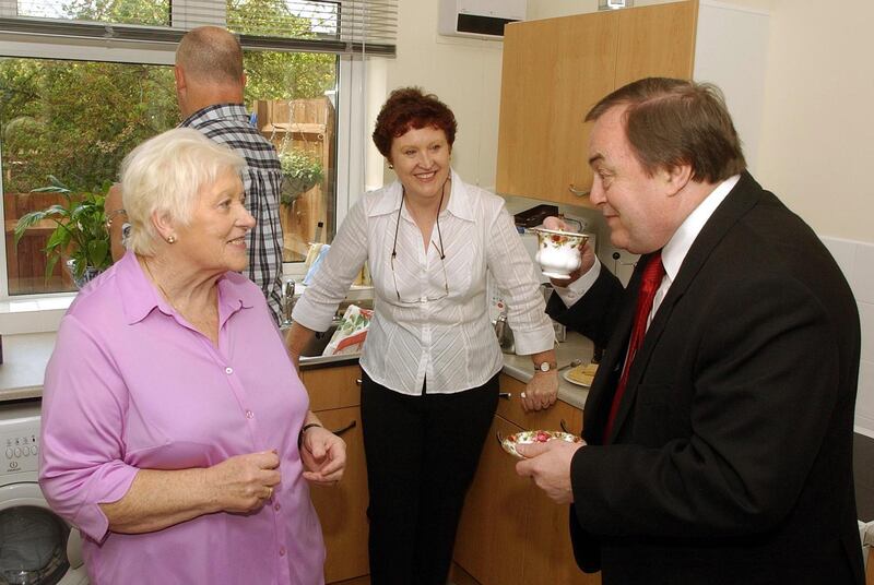 John Prescott enjoying a cup of tea as part a visit to promote the Government’s Decent Homes programme in 2004