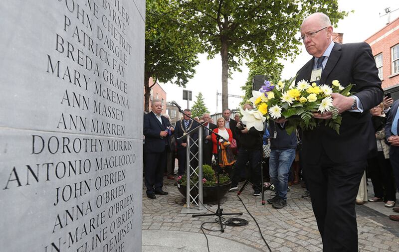 Minister for Foreign Affairs Charlie Flanagan lays a wreath during a memorial ceremony in Dublin's Talbot Street marking the anniversary of the bombings in Dublin and Monaghan on May 17 1974&nbsp;