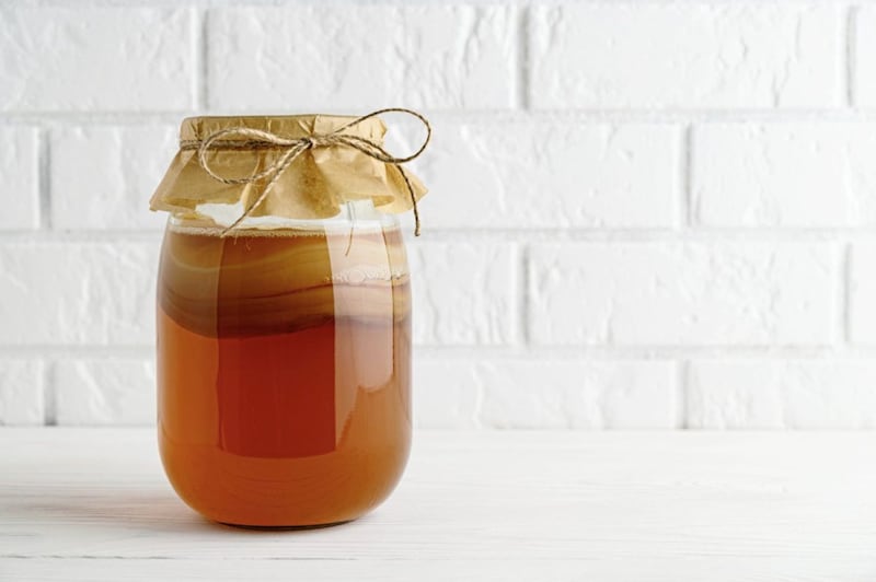 Kombucha, sweet tea fermented using a culture of bacteria and yeast 