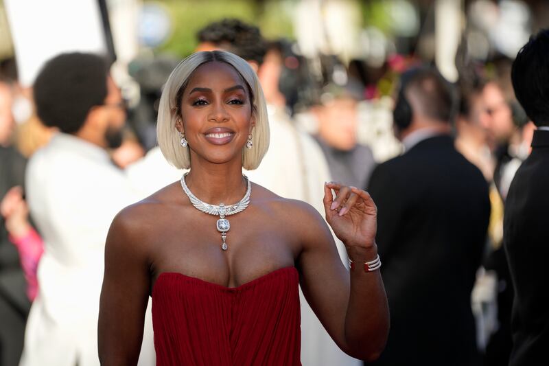 Kelly Rowland poses for photographers upon arrival at the premiere of the film Marcello Mio at the 77th international film festival in Cannes (Andreea Alexandru/Invision/AP)