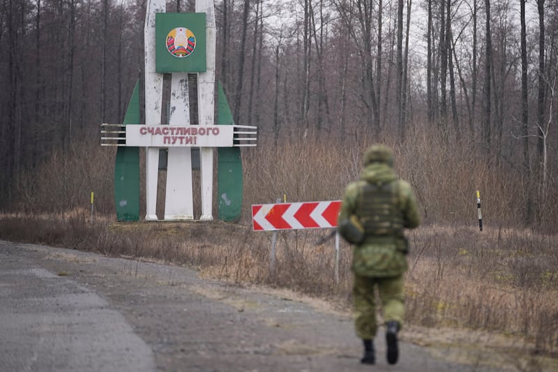 A Belarusian soldier patrols the border (AP)