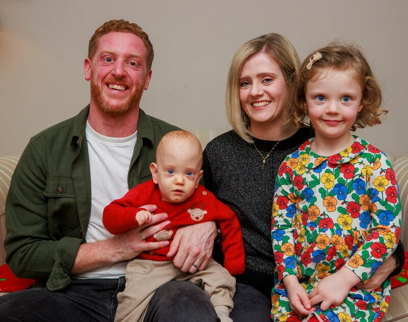 Matthew and Lindsay Ace with their four-year-old daughter Aine and 14-month-old son Iarla at their family home in Castlecaulfield near Dungannon, Co Tyrone. PA Photo. Picture date: Monday December 17 2024. See PA story ULSTER Baby. Photo credit should read: Liam McBurney/PA Wire