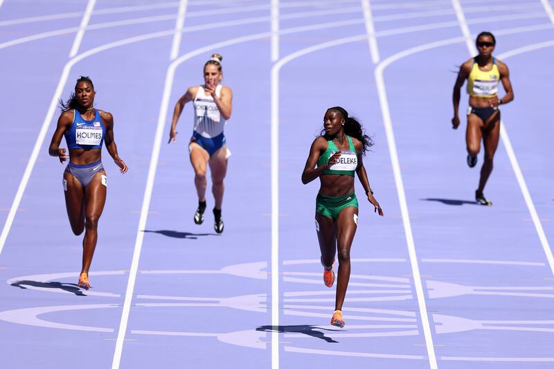 Rhasidat Adeleke cruises across the line first in Monday's 400m heat to seal a spot in Wednesday night's Olympic semi-final. Photo by Hannah Peters/Getty Images