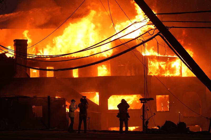 Beach front homes were destroyed by fire in Malibu (Mark J Terrill/AP)