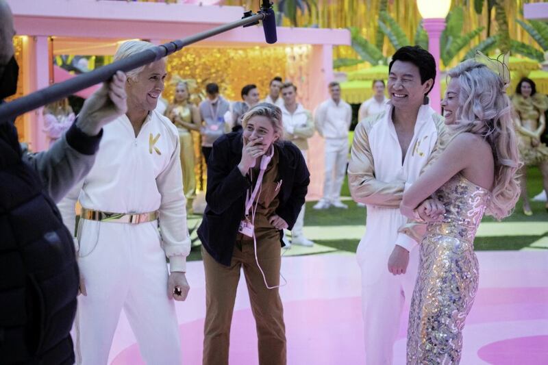 Ryan Gosling as Ken, director/writer Greta Gerwig, Simu Liu as Ken and Margot Robbie as Barbie 