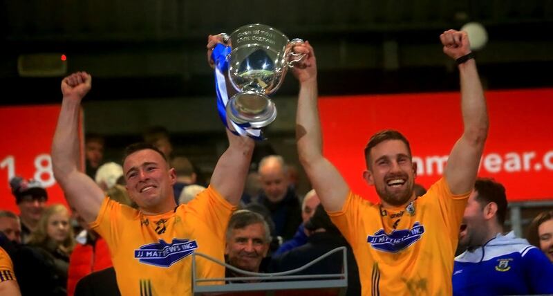 Dromore's Tiarnan and Niall Sludden with the O'Neill Cup after winning the Tyrone SFC.<br />Picture Seamus Loughran&nbsp;