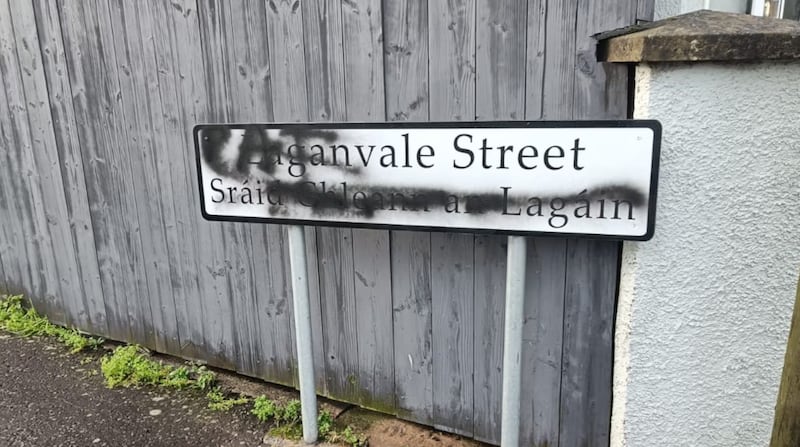 A dual language sign at Laganvale Street in the Stranmillis area was covered with black paint