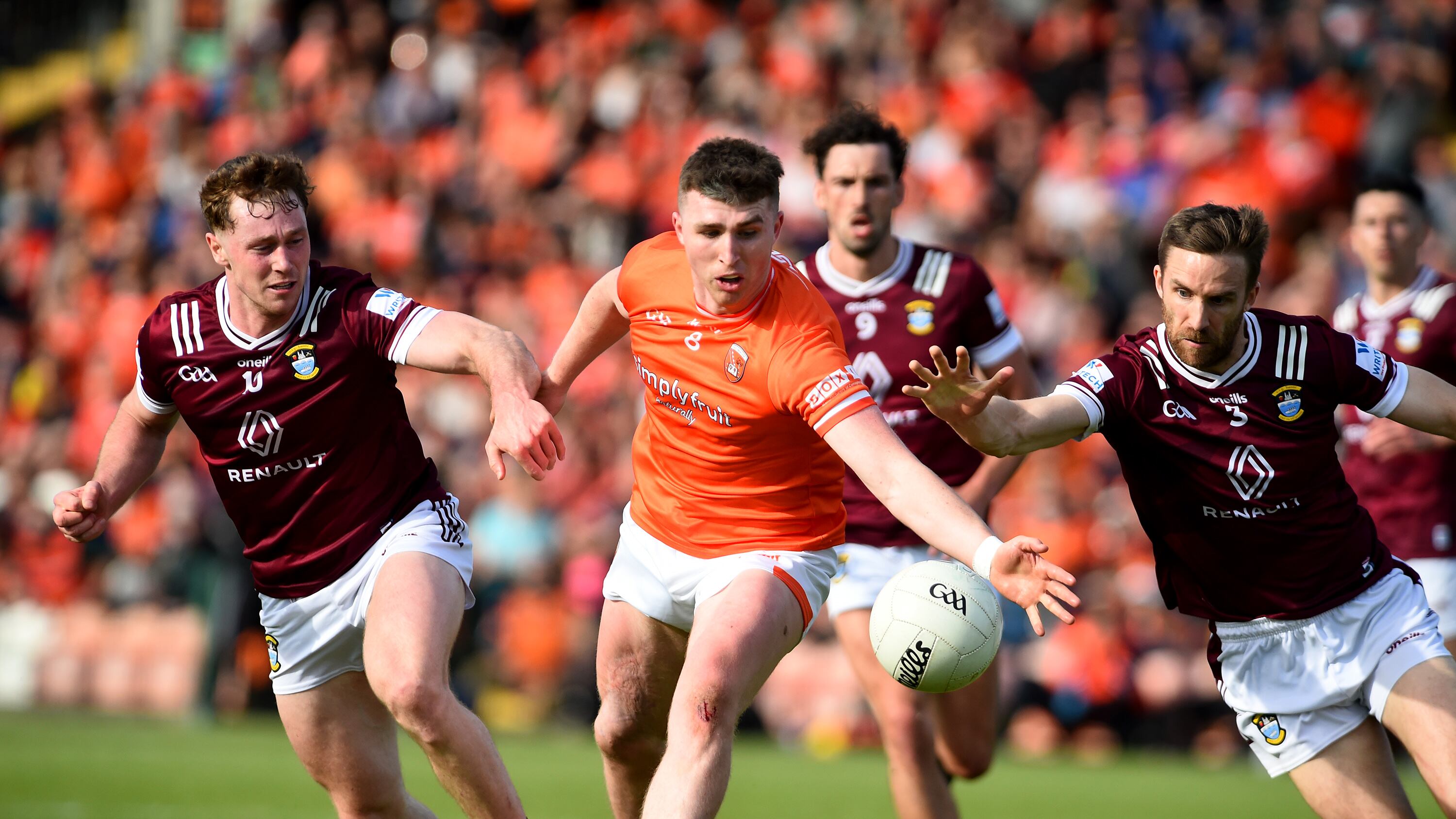 Armagh's Tiernan Kelly on the attack with Westmeath's Jonathan Lynam and Kevin Maguire in pursuit. Picture: John Merry