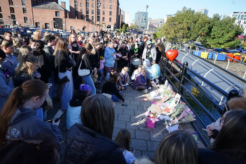 Fans attend a vigil for Liam Payne