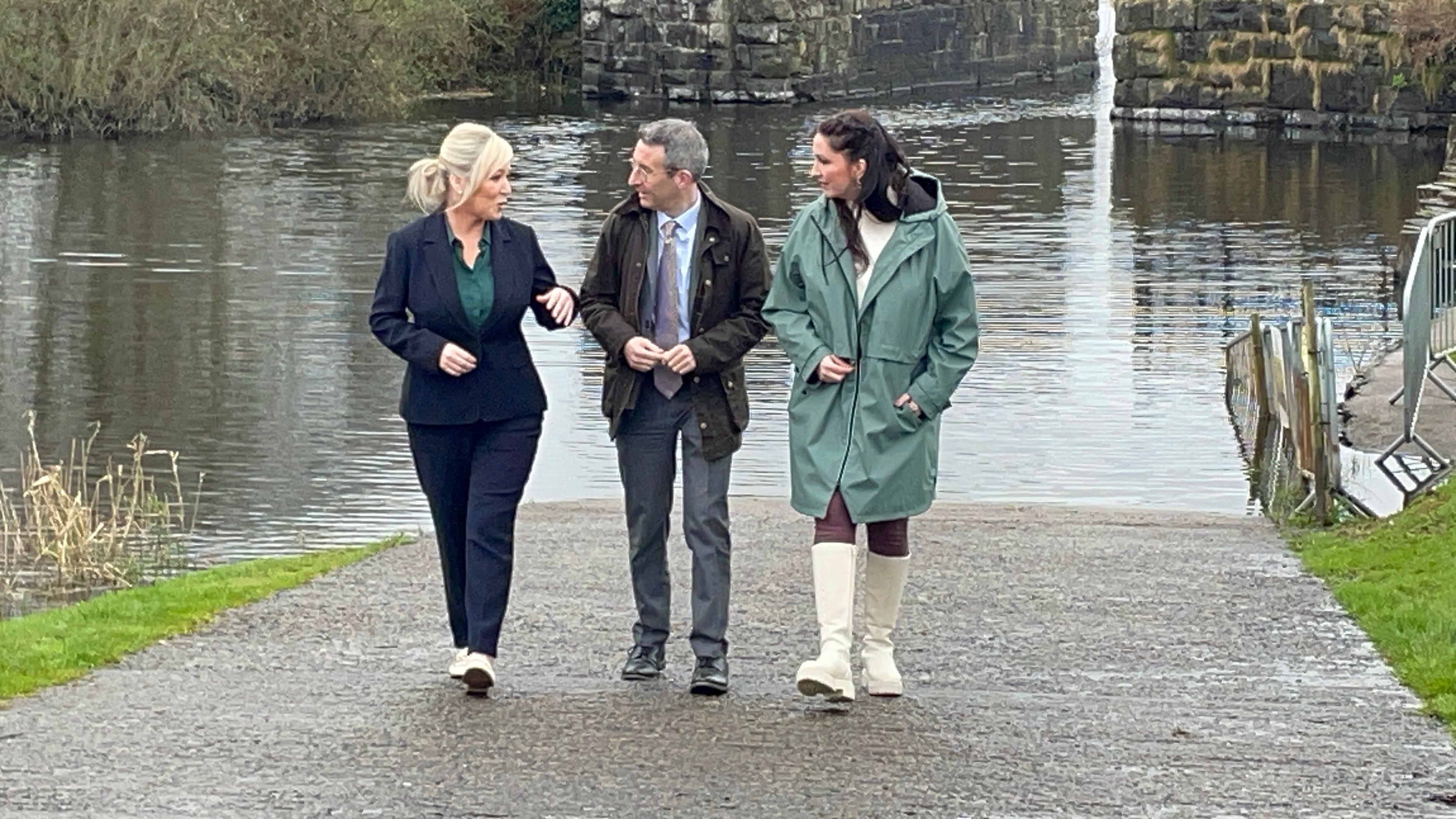 Agriculture Minister Andrew Muir pictured with First Minister Michelle O'Neill (left) and Deputy First Minister Emma Little-Pengelly at the edge of Lough Neagh