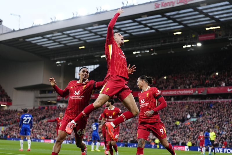 Curtis Jones (centre) celebrates scoring Liverpool’s winner