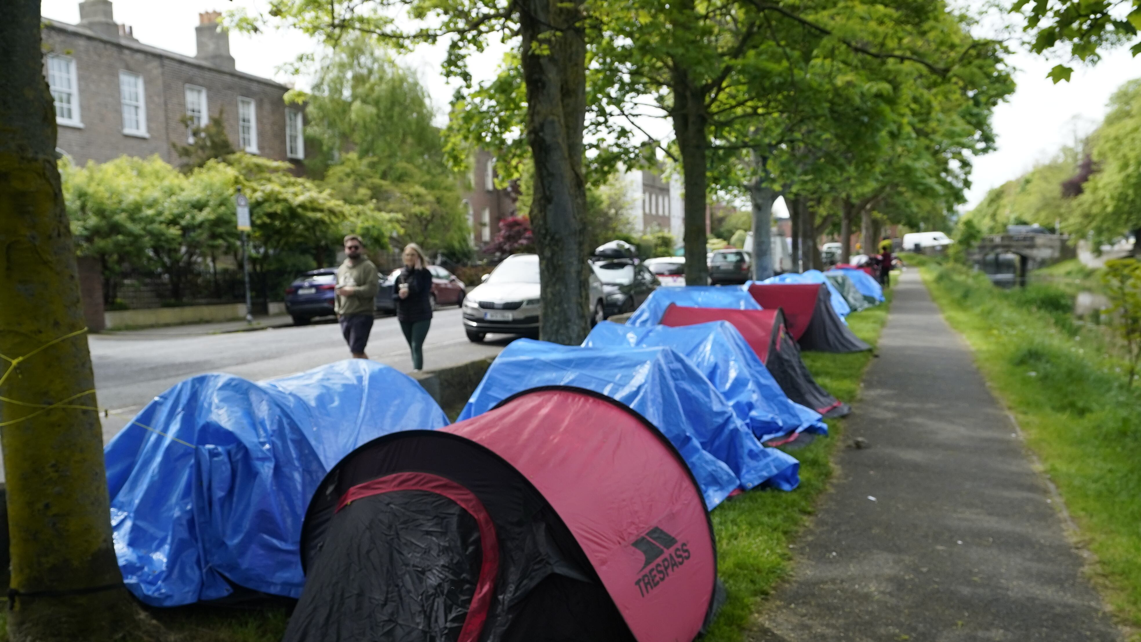 Tents have been pitched by asylum seekers along a stretch of the Grand Canal, Dublin, near to the International Protection Office