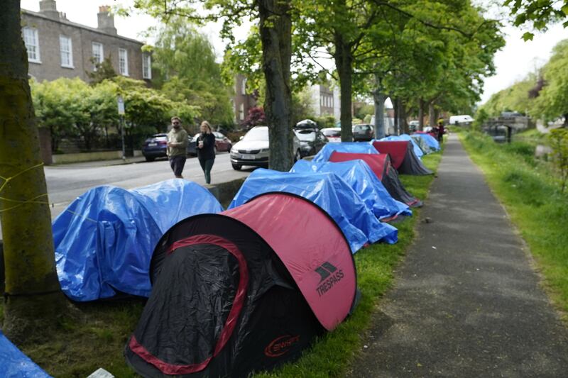 Tents have been pitched by asylum seekers along a stretch of the Grand Canal, Dublin, near to the International Protection Office