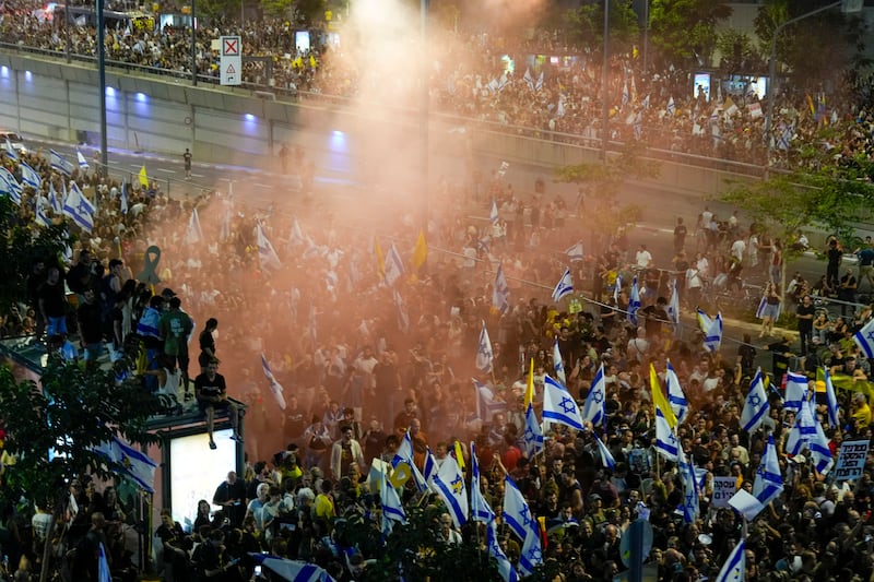 People in Tel Aviv, Israel, protest in grief and anger after six hostages were found dead in the Gaza Strip (Ariel Schalit/AP)