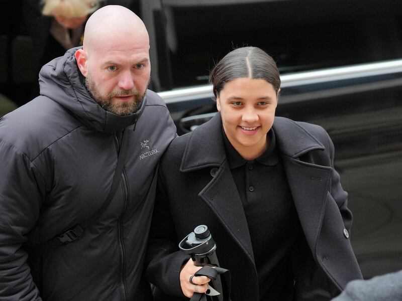 Chelsea and Australia striker Sam Kerr (right) arrives at Kingston Crown Court