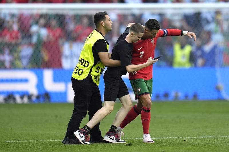 Ronaldo’s patience grew thinner with each pitch invader
