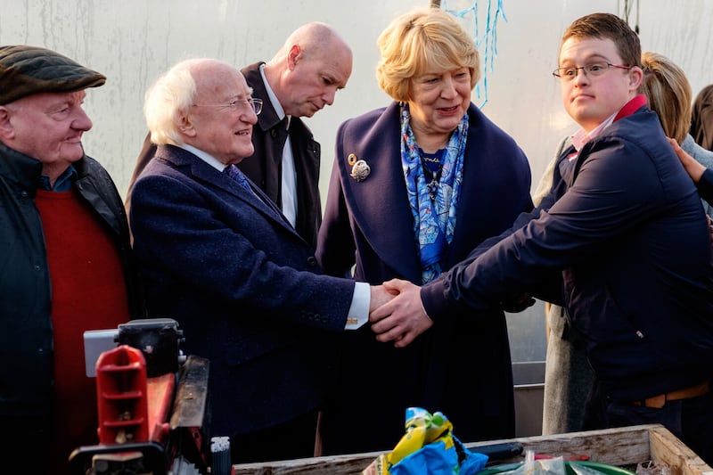 President Michael D. Higgins and his wife Sabina planted the first native sapling for Brian's Woodland project and met social farm participants at An Tobar Community Wellness Centre and Social Farm in Silverbridge