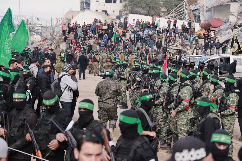 Hamas and Islamic Jihad fighters are deployed in central Gaza City ahead of the release of four Israeli female hostages (AP Photo/Abed Hajjar)