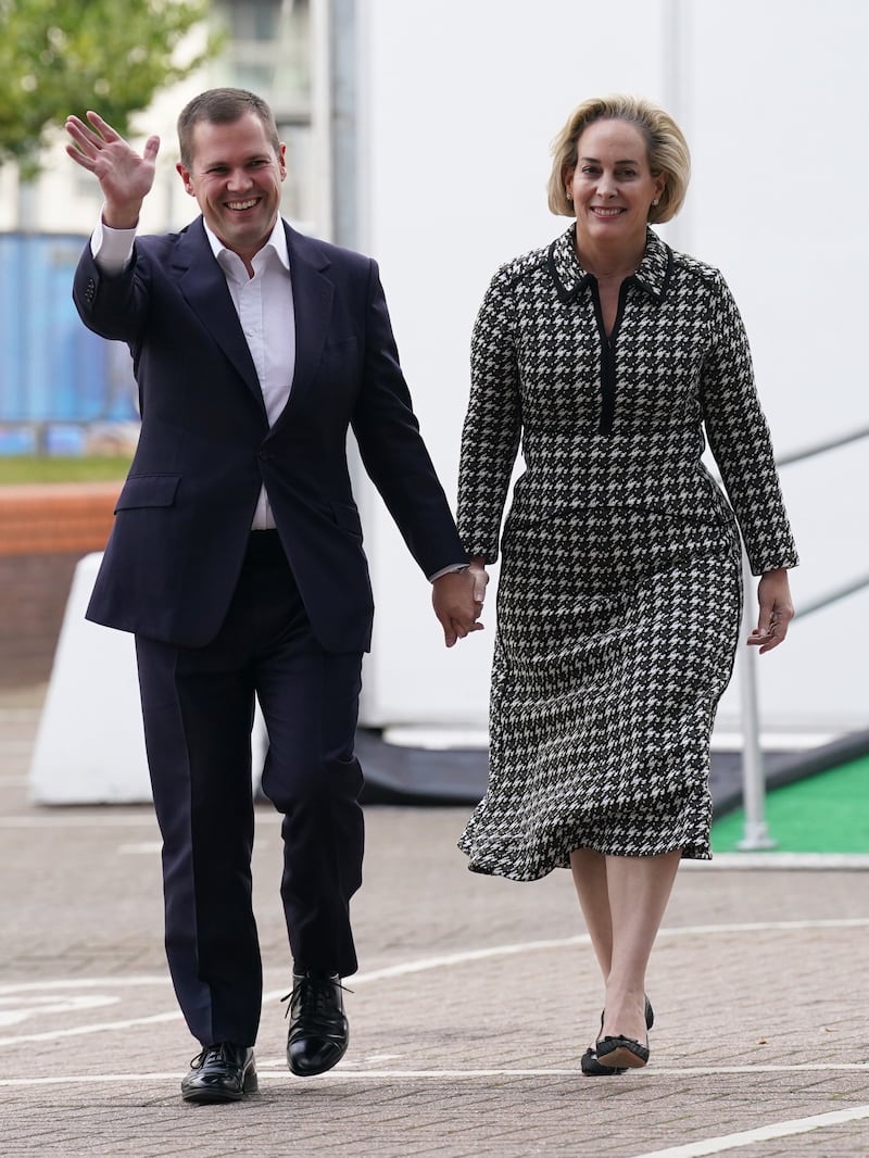 Robert Jenrick with his wife Michal Berkner arriving in Birmingham