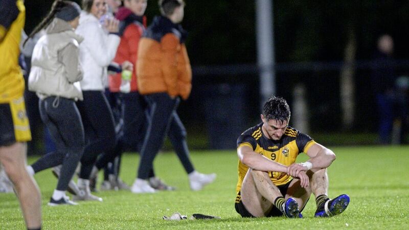 Portglenone&rsquo;s Niall McKeever sits dejected on the pitch Picture Mark Marlow 