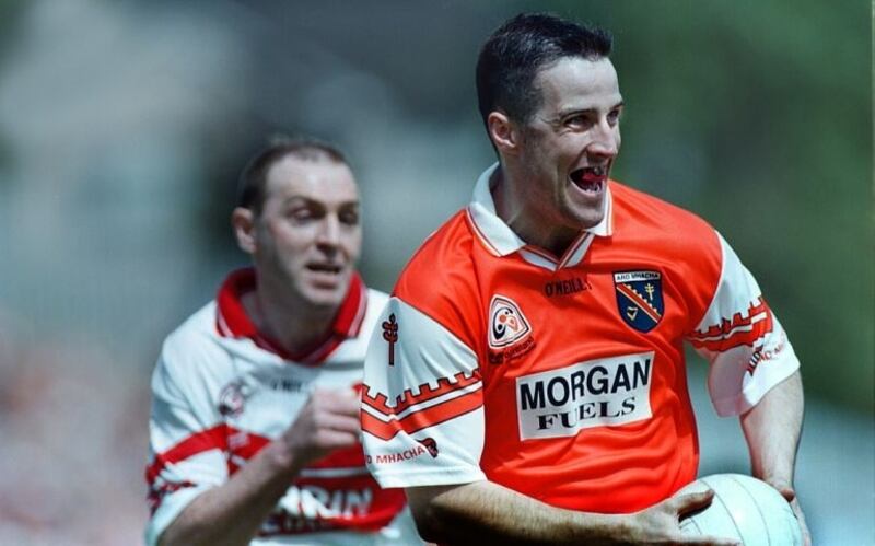 Armagh's Barry O'Hagan leaves Derry's Henry Downey in his wake during the 2000 Ulster final at Clones. Picture: Ann McManus