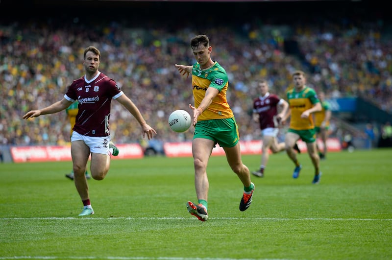 Donegal's Michael Langan and Galway's Paul Conroy