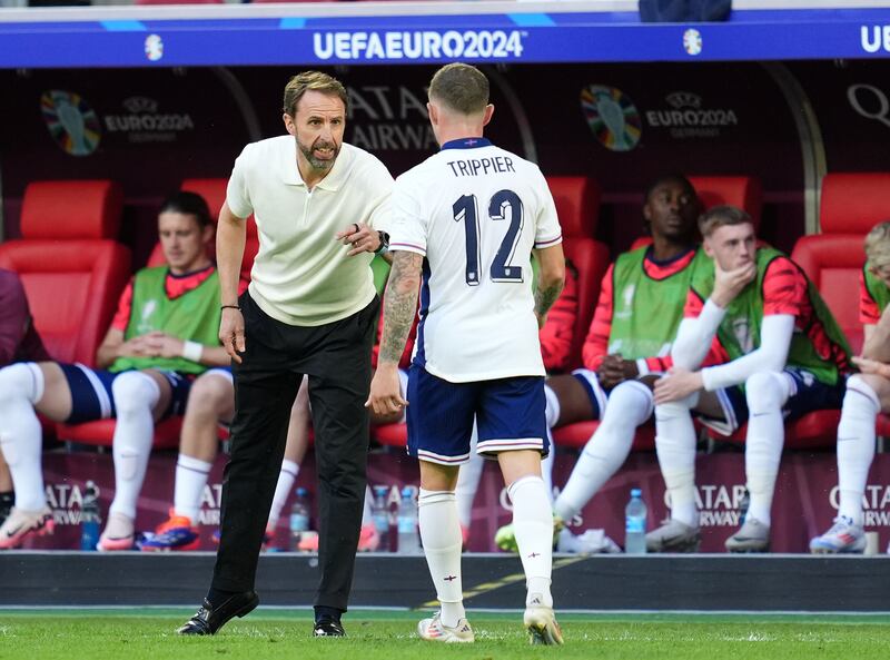 Southgate (left) again left his subs until late in the game