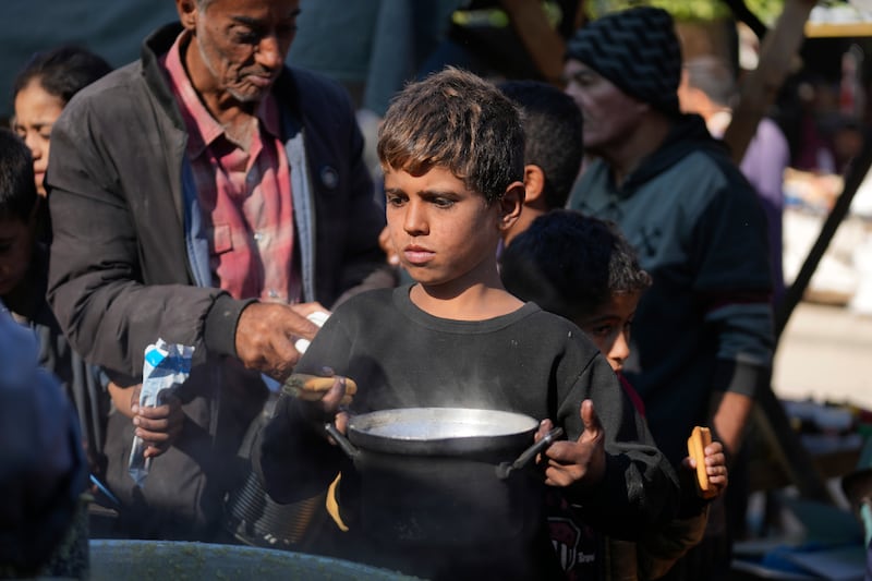 The theft of nearly 100 trucks loaded with food over the weekend sent prices soaring and caused shortages in central Gaza (Abdel Kareem Hana/AP)