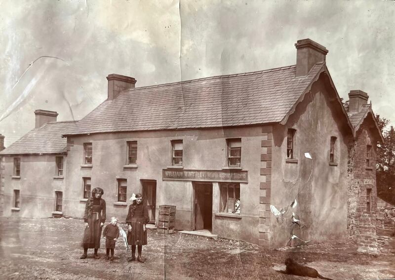 Members of the Whittley family outside the KIngsmoss Tavern c1907