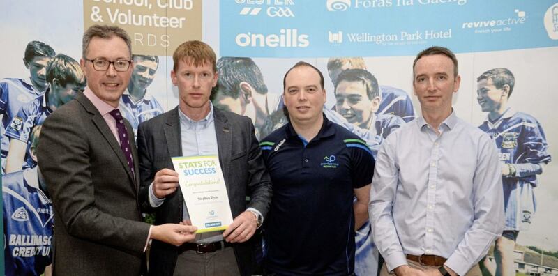 Abbey CBS Grammar School student Stephen Dyas wins Student GAA Analyst of the Year for his contribution to the Irish News and Performa Sports Stats for Success initiative. Pictured from left to right John Brolly of the Irish News, Jody Gormley (Abbey CBS teacher), Danny and Joe Turley of Performa Sports.