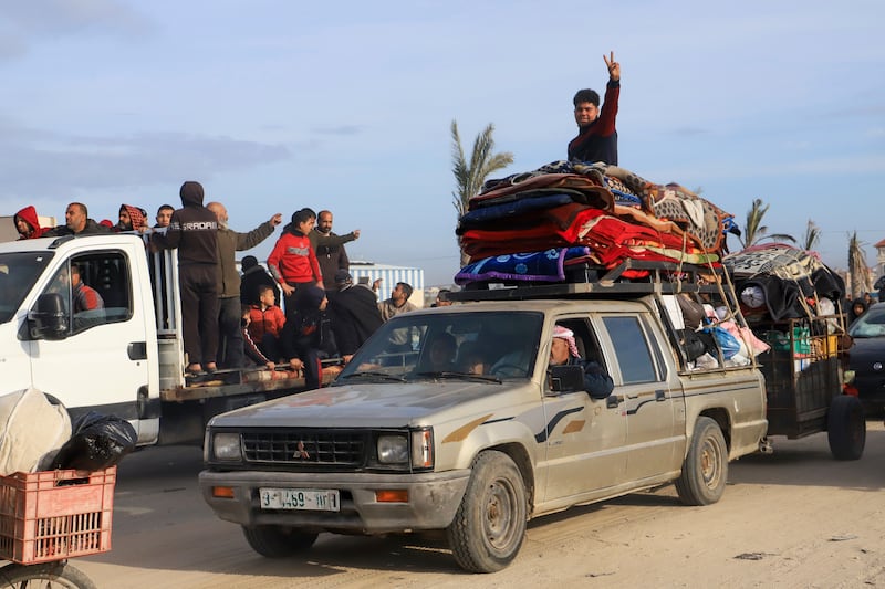 Displaced Palestinians return to Rafah as the ceasefire began (Mariam Dagga/AP)