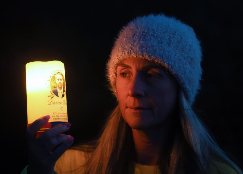 Donna Johnston taking part in the Darkness Into Light walk in Hannahstown in memory of her brother Darren O'Neill. PICTURE: MAL MCCANN