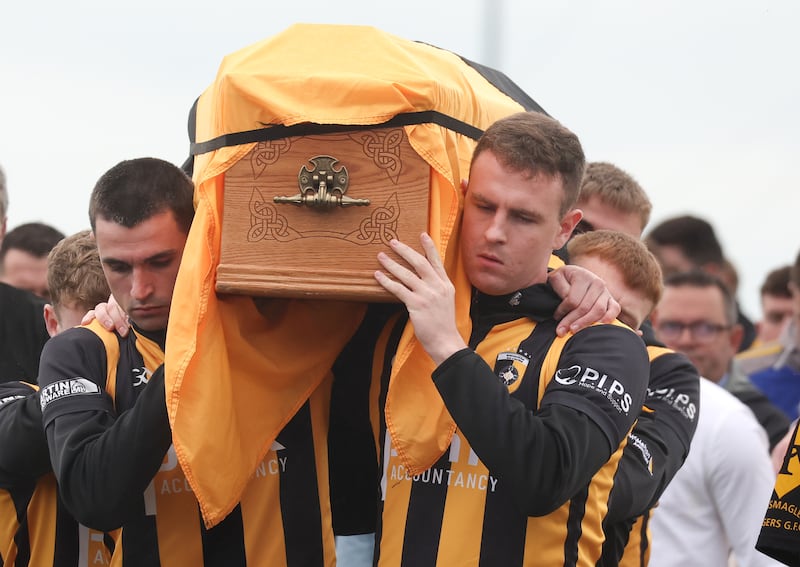 Family and Friends  carry the coffin of Crossmaglen Rangers player Caolan Finnegan during his funeral on Monday, Caolan received a lap of honour at Crossmaglen ground before the funeral at St Patrick’s Church.
PICTURE COLM LENAGHAN