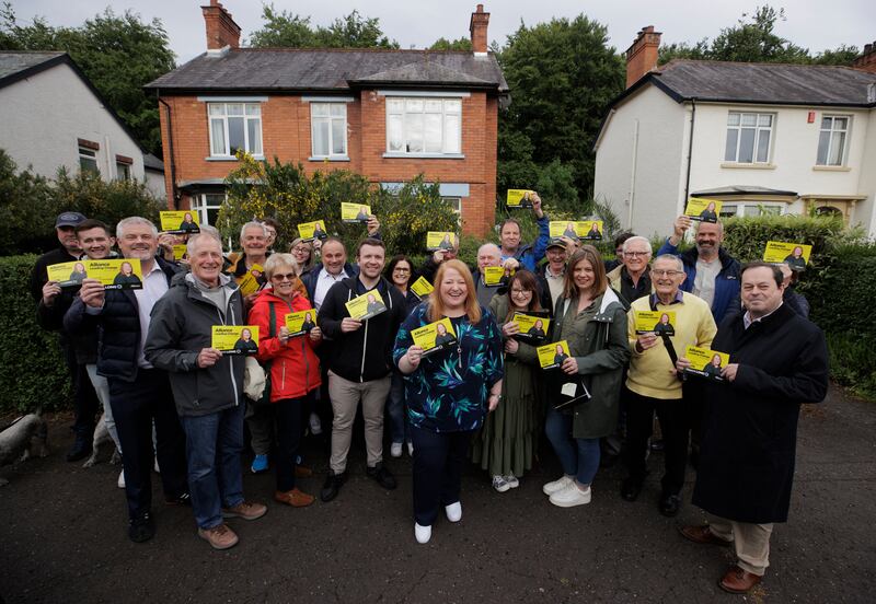 Alliance leader Naomi Long (centre) with her canvassing team in east Belfast .
