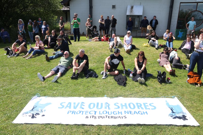 Environmental campaigners hold a protest at Oxford Island, Lough Neagh. Picture: MAL MCCANN